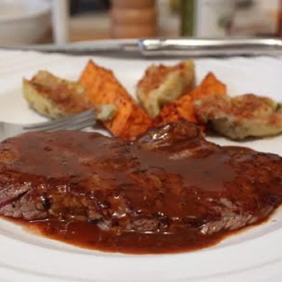 Grilled Steaks with Mouthwatering BBQ Butter Sauce